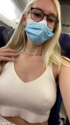 Blonde Slut's Mile-High Pussy Flash in Airplane Throne