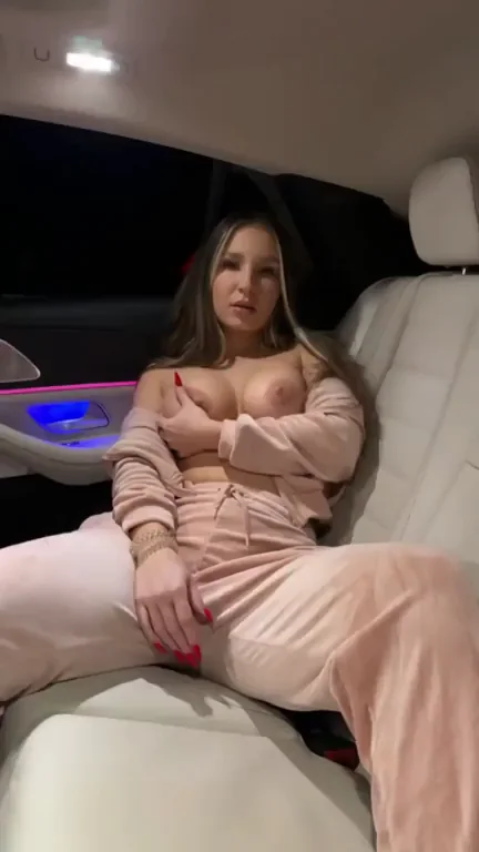 Busty Babe's Tits Begging for Attention in Luxury Car