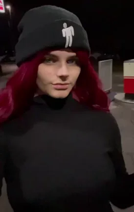 Petrol Pump Tease: Petite Redhead's Massive Tits Spill Out in Public Dare
