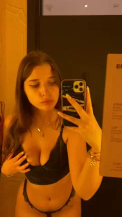 Changing Room Tease: Busty Babe's Cleavage Selfie Seduction