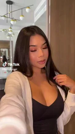 Cute Busty Asian Babe Teasing in Tight Top