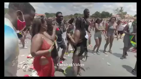🍈 Massive Ebony Titties Struggling in Bikini Tops at Carnival Bounce Fest! 🎉