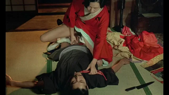 Eiko Matsuda rides the main actor in 'In the Realm of the Senses' ('Ai no korÃ®da', 1976)