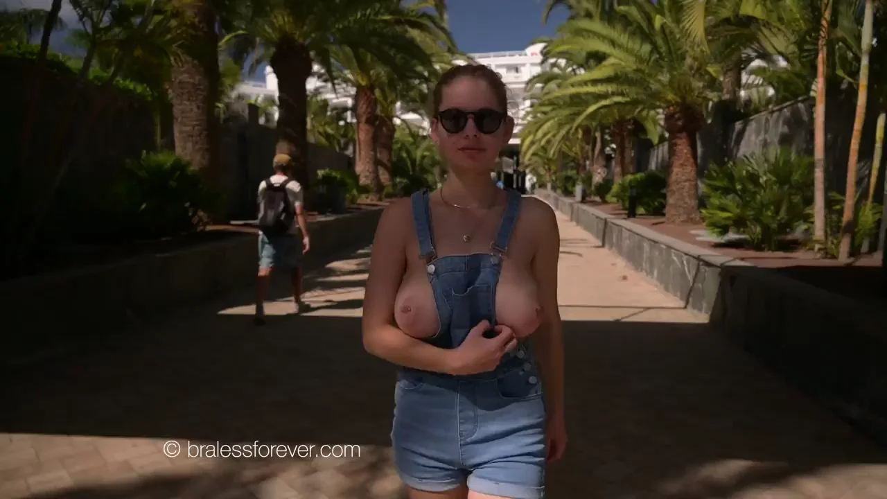 Mila flashing her big boobs in overalls
