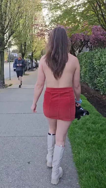 Topless Slut Struts Her Bare Tits Down Public Sidewalk