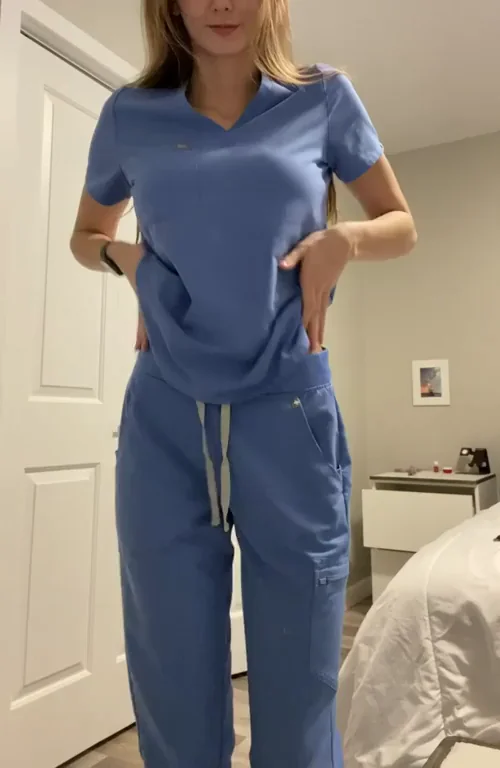 Tattooed Nurse Slut Teases Tits and Ass in Scrubs
