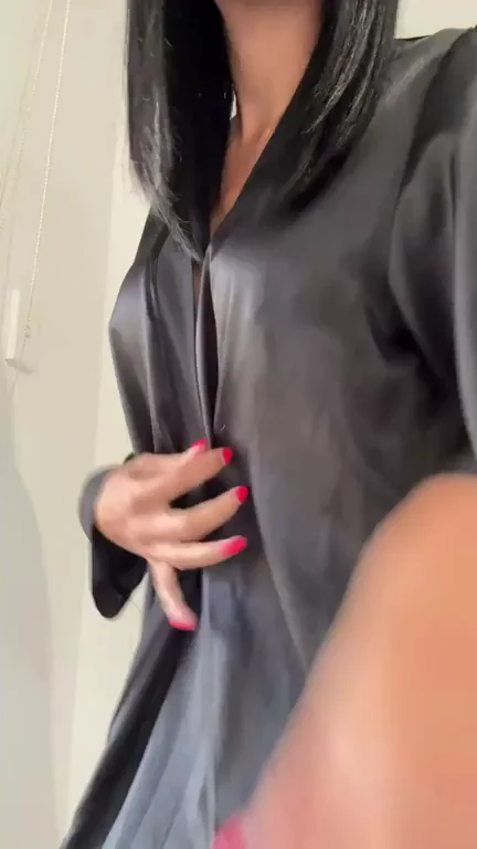 Slick Leather Tease: Ebony Babe's Slutty Outfit Reveal
