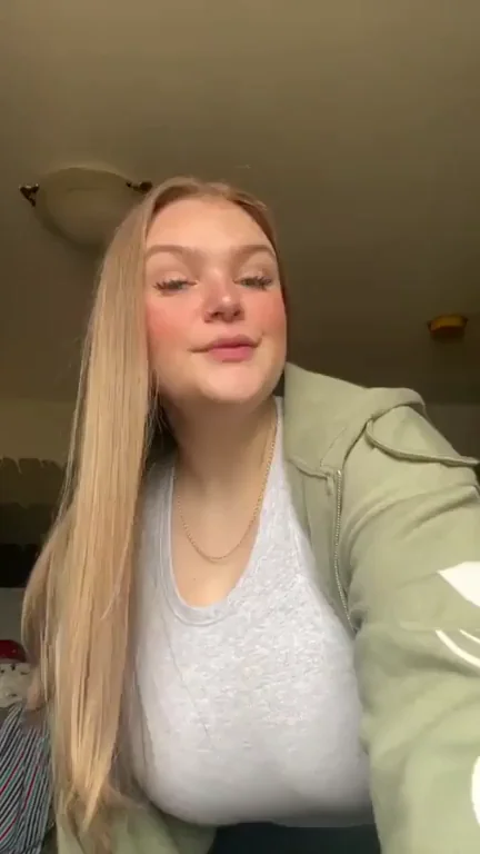 Busty Blonde Tease Can't Hide Those Massive Tits
