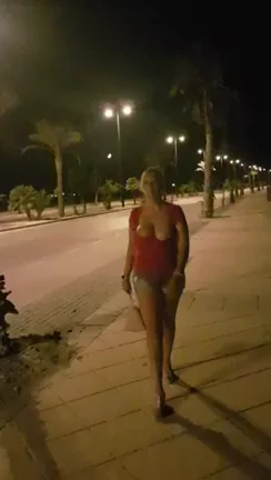 a little drunk and waling down the road with my tits out