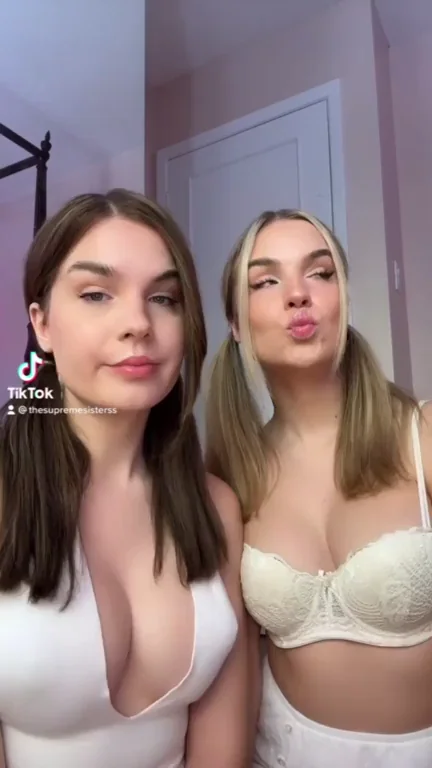 Twin Sluts Bond Over Massive Tits & Pouty Kisses