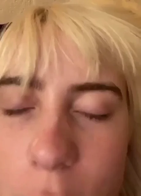 Blonde Billie Eyes Half-Closed in Ecstatic Motion