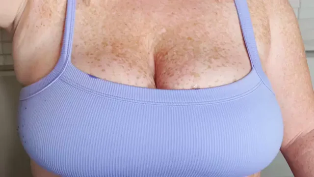 Tittyfuck and cum between my freckled jugs in a sports bra!
