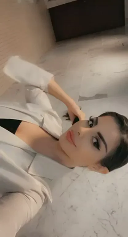 Bra-Free Boss Babe Teases in Tight Blazer at the Office