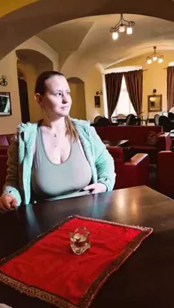 As you can see for yourself, using the example of these ladies behind me, when you have a nice conversation and drink wine, you don't even notice something as big as my boobs. Heh