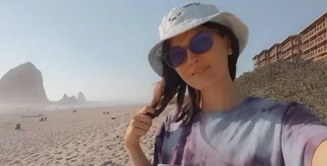 Beach Slut Flashes Massive Tits in Public GIF