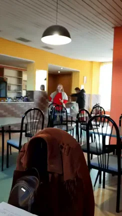 The gentleman was so busy packing a take-out lunch that he didn't even notice that huge, juicy boobs suddenly appeared right next to him. Heh