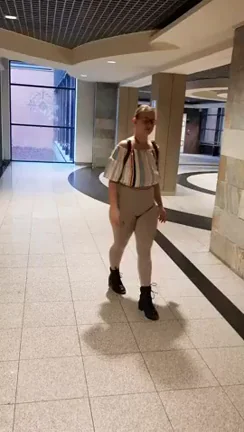 Mall, just before a movie screening. It looks like someone wants to whack me with a mandolin for showing those huge boobs of mine. Heh