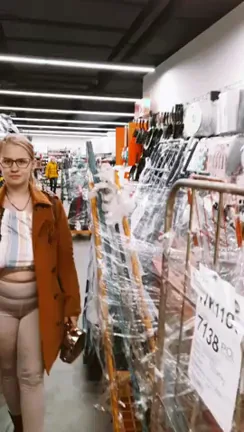 The lady working in the store looked at me strangely, but I don't think she suspected that I was just showing my huge tits there. heh