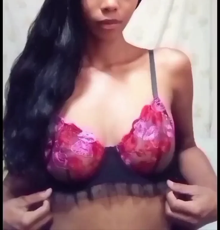 Playful Latina Tease in Lacy Pink Lingerie