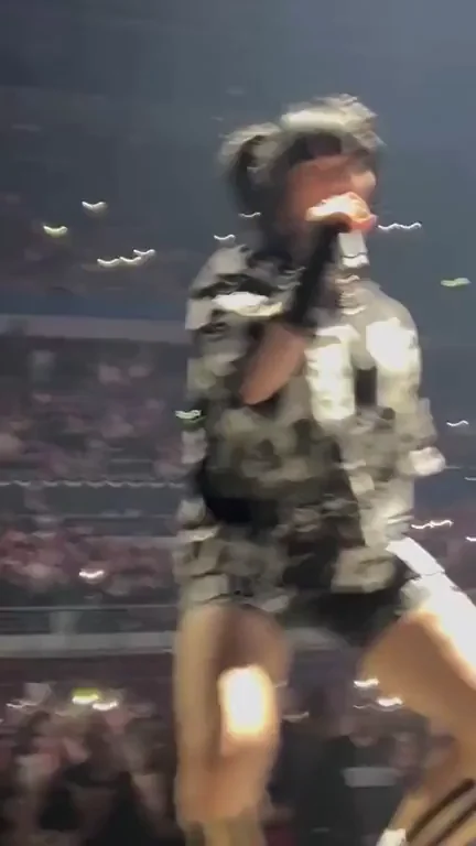 Billie Eilish Gets Low: Squatting Tease with Thick Thighs Staring You Down