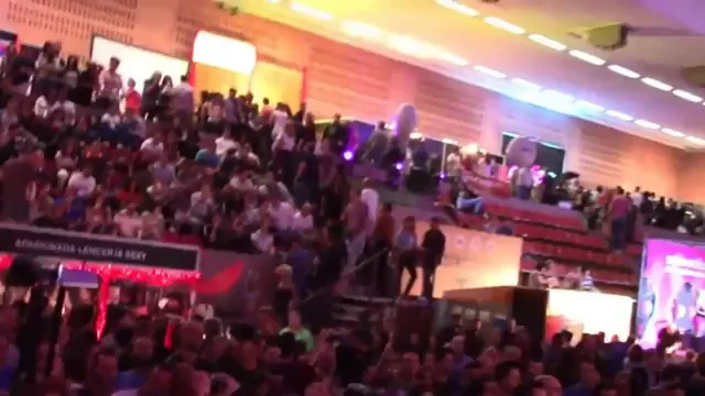 Massive Crowd Watches Busty Slut Get Fucked On Stage