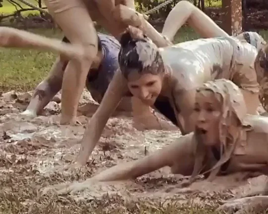 Anna Kendrick playing in the mud