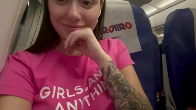 Airplane Slut Teases: 'Wanna Taste My Perky Pussy?'