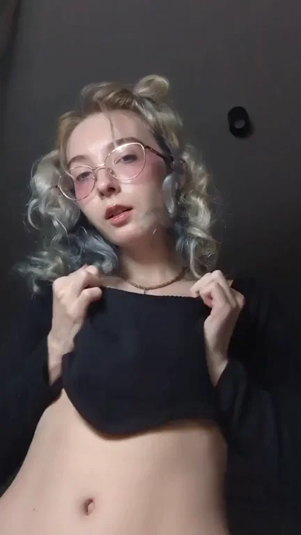 Horny doll drops her perfect boobs