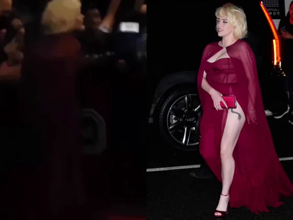Billie's leg in a red dress