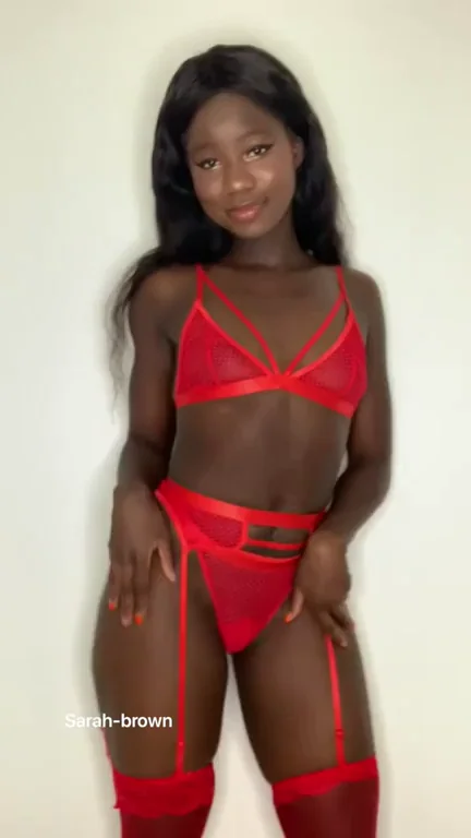 Ebony Babe Teases: Red Lingerie Strip or Bare Pussy?