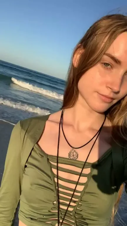 Flashing my b cups on the beach ;)
