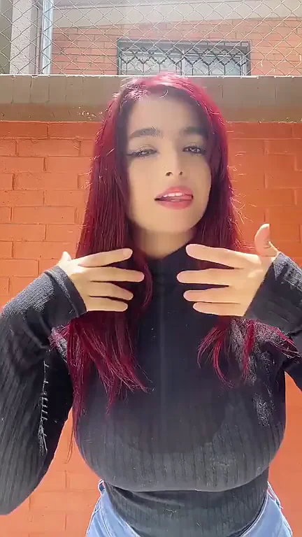 🔥 Busty Redhead's Massive Tits Tease in Tight Sweater 😍