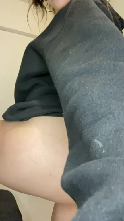 College Slut Bends Over in Hoodie, Teasing Her Juicy Booty for Daddy