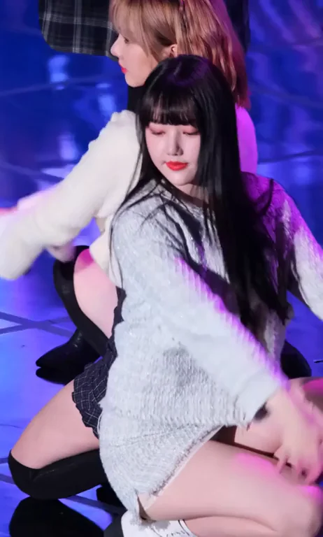 Yerin from ex-GFRIEND Teasing in Plaid Skirt and Thigh-High Stockings