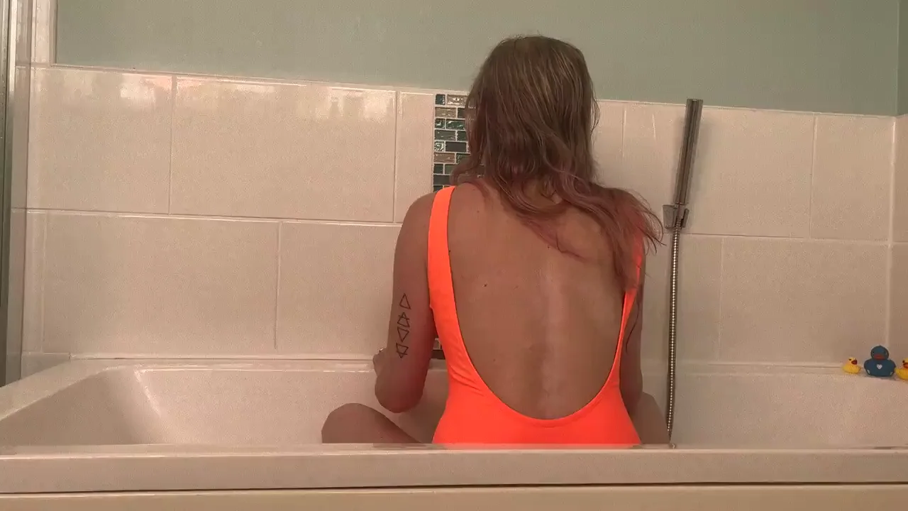 Petite 5'0 Nymph's Steamy Bath Tease in Neon Orange Slingshot
