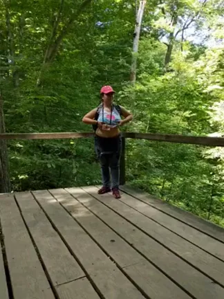 Sweaty Trail Tease: Redhead Flashes Slutty Curves in the Woods