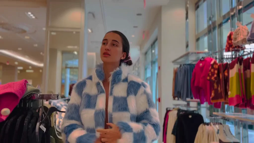 Without a bra in the store [gif]