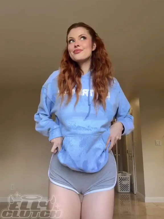 🔥 Fiery Redhead Tease: Massive Tits Spill Out from Hoodie Surprise! 😈