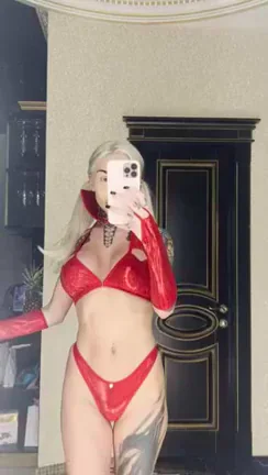 Hot Cosplay Slut in Shiny Red Latex Teases Her Tats and Tits