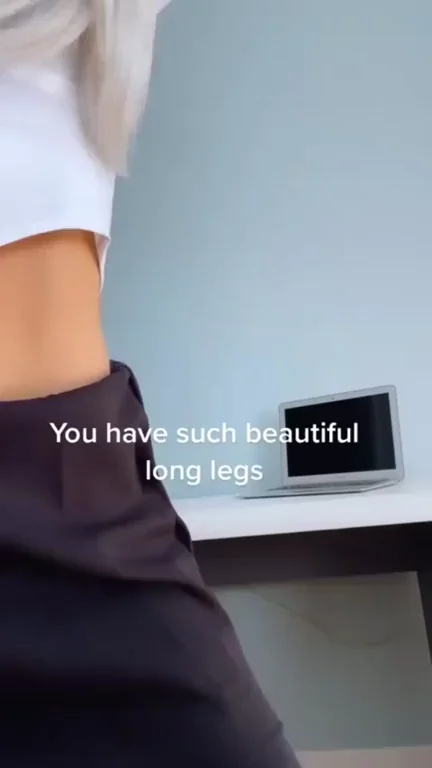 2002 Office Slut Bends Over, Teasing Long Legs for Your Instant Boner