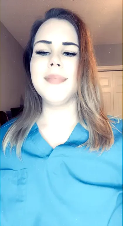 Showing off whats under my scrubs