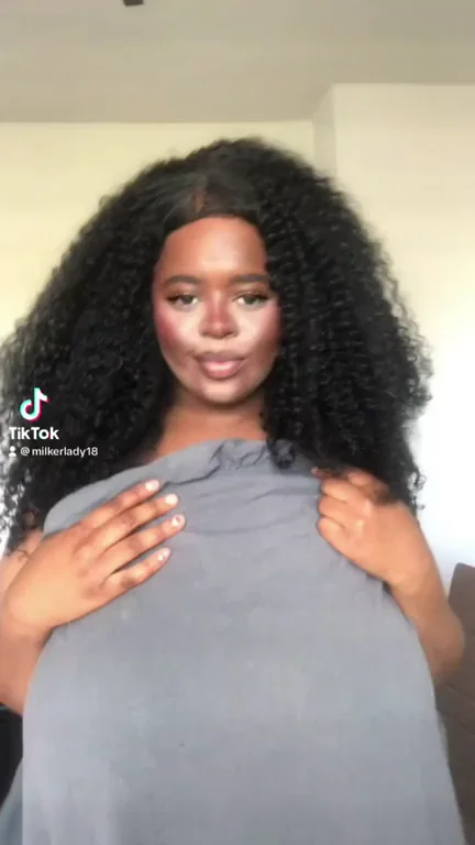 Busty Ebony Babe Teases Massive Naturals Under Grey Top 💦🍈🍈