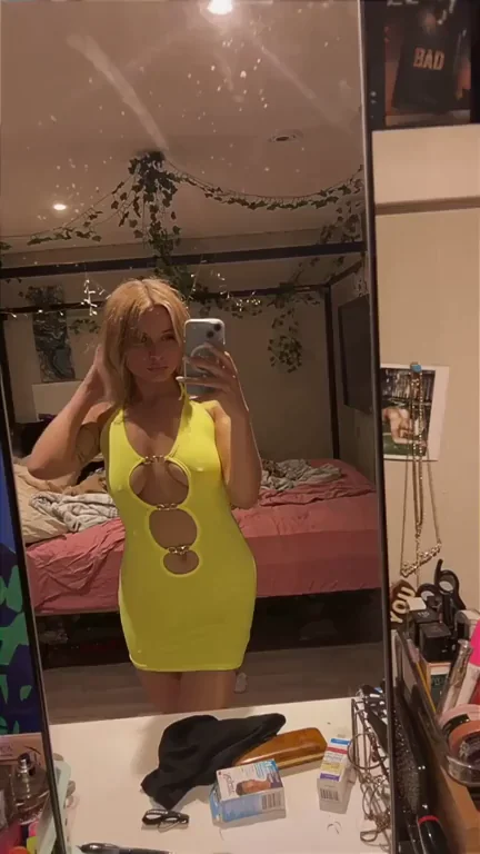Poking through this pretty dress