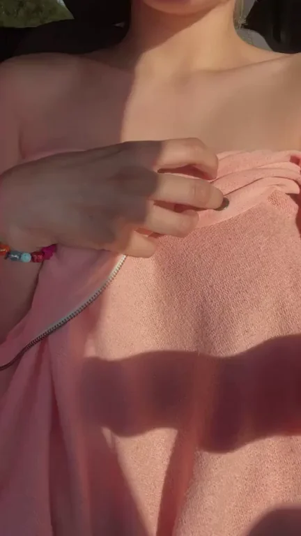 Teasing Surprise: Busty Asian Babe Drops Her Top for Massive Tit Reveal