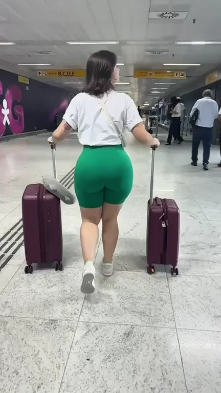 🍑 Barely Legal Babe's Ass Barely Fits Those Tiny Green Shorts! 😈
