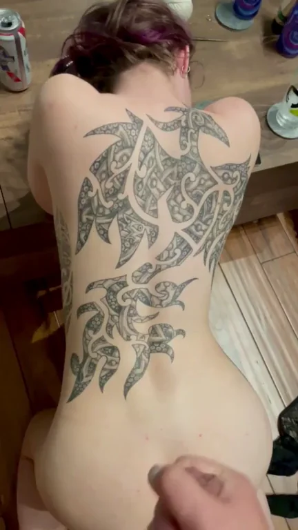 Taking some artistic license with this little slut's back tattoo [OC]