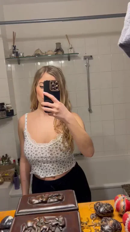 Blonde Bombshell Teases Her Massive Torpedo Tits Surprise