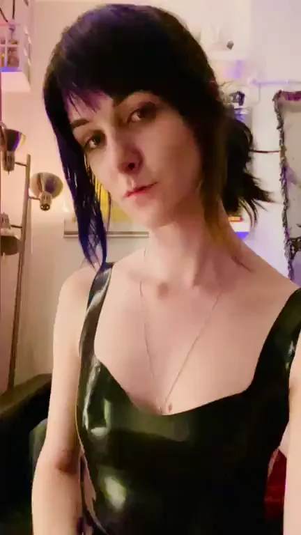 What’s your favorite— my latex dress, my big girlcock, or my smile?