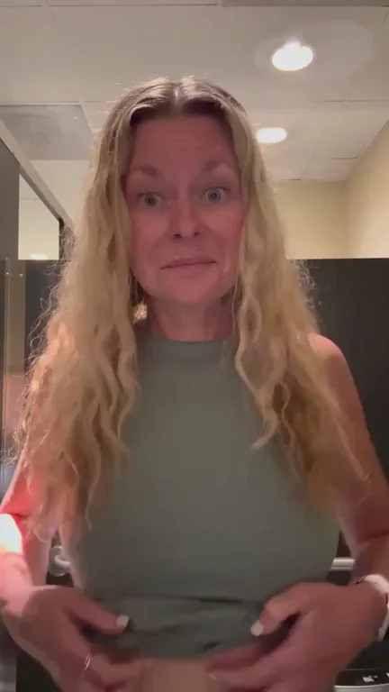 MILF Tease: Naughty Blonde Bombshell Cups Her Juicy Rack