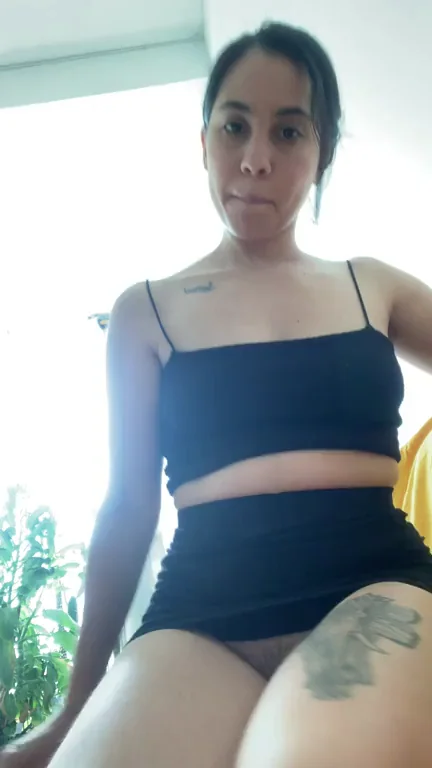 with a skirt it is better from behind or in front